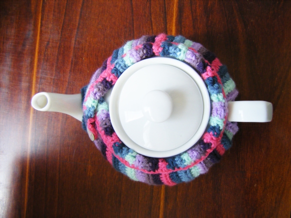 Crocheted tea cosy top view